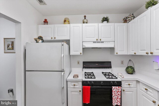 20273 Beechwood Ter Unit 103, Ashburn, VA 20147 - kitchen featuring freestanding refrigerator, range with gas stovetop, under cabinet range hood, white cabinets, and light countertops