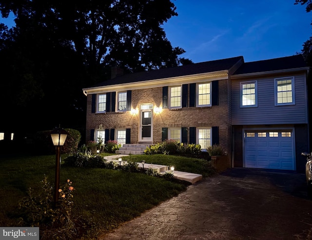4909 King David Blvd, Annandale, VA 22003 - bi-level home with driveway and an attached garage