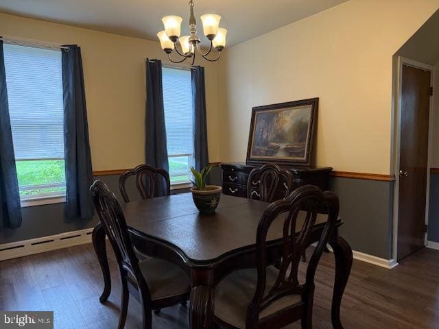 2329 Canby St, Harrisburg, PA 17103 - dining area featuring a chandelier, wood finished floors, a baseboard radiator, and baseboards
