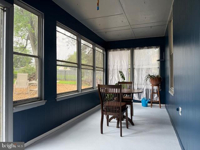 2329 Canby St, Harrisburg, PA 17103 - sunroom / solarium with healthy amount of natural light and finished concrete flooring