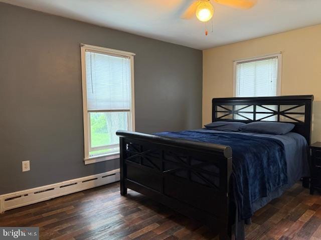 2329 Canby St, Harrisburg, PA 17103 - bedroom with a baseboard radiator, wood finished floors, and ceiling fan