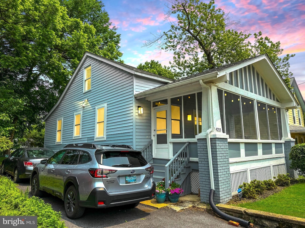 4213 Rainier Ave, Mount Rainier, MD 20712 - view of front of property featuring a sunroom