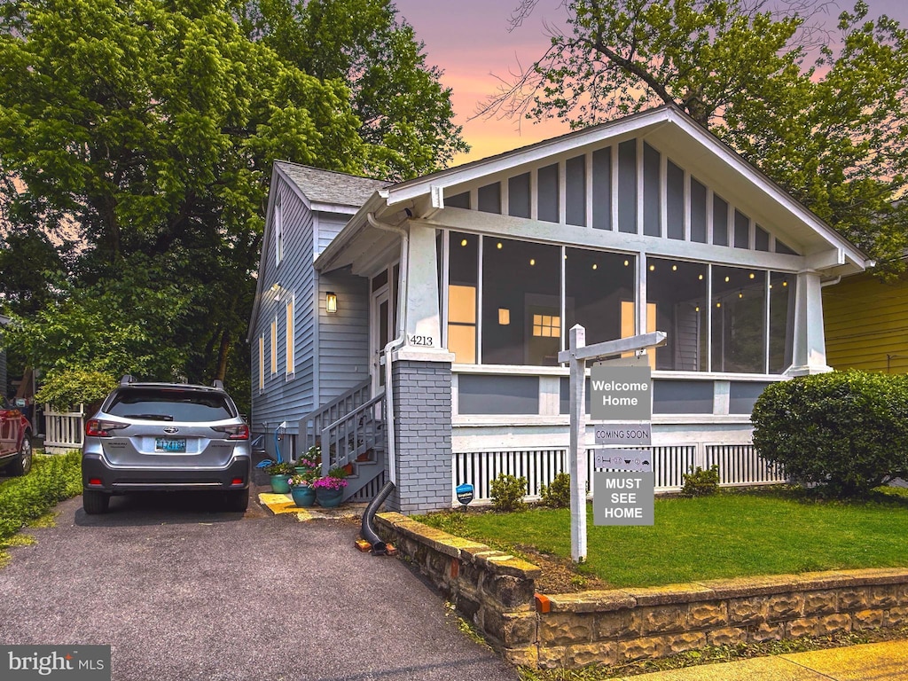 4213 Rainier Ave, Mount Rainier, MD 20712 - view of front of property featuring a front lawn
