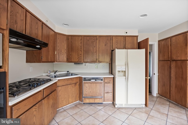 1101 Cherry Ln, Cinnaminson, NJ 08077 - kitchen with white fridge with ice dispenser, paneled dishwasher, a sink, stainless steel gas cooktop, and under cabinet range hood