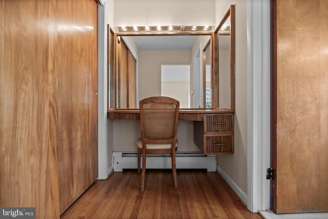 1101 Cherry Ln, Cinnaminson, NJ 08077 - home office with wood finished floors, a baseboard heating unit, and baseboards