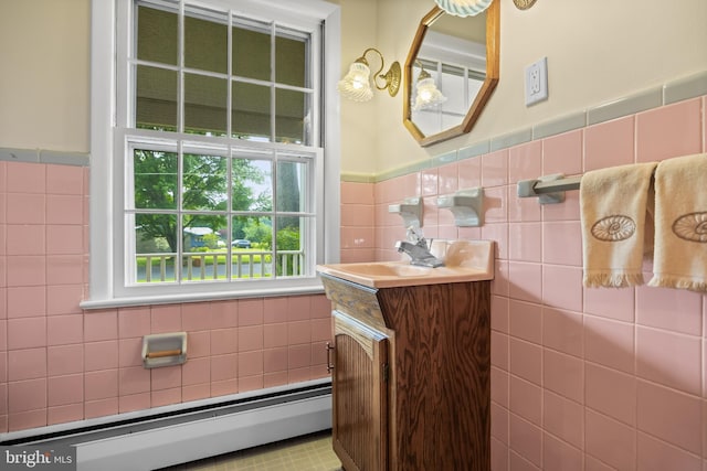 1101 Cherry Ln, Cinnaminson, NJ 08077 - bathroom with baseboard heating, tile walls, vanity, and wainscoting