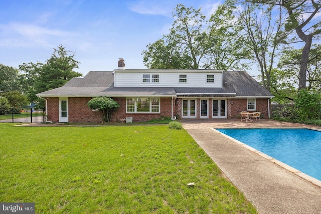 1101 Cherry Ln, Cinnaminson, NJ 08077 - rear view of property featuring brick siding, a chimney, a patio, and french doors