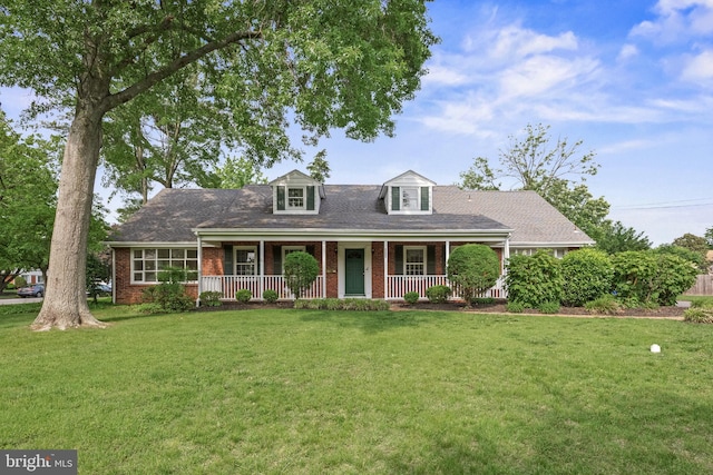 1101 Cherry Ln, Cinnaminson, NJ 08077 - cape cod home with brick siding, a porch, a front yard, and roof with shingles