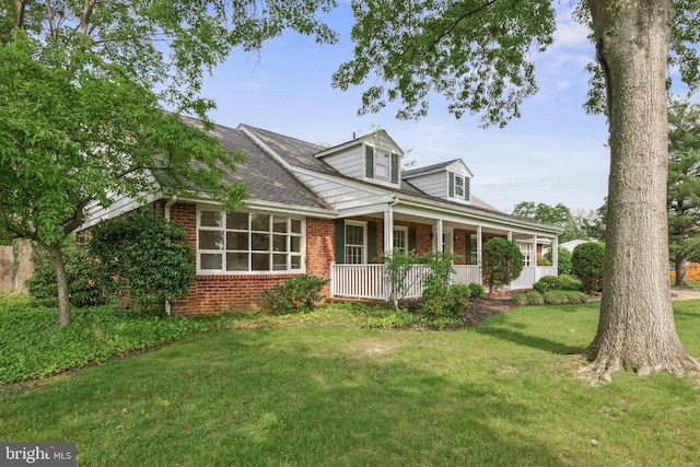 1101 Cherry Ln, Cinnaminson, NJ 08077 - cape cod home featuring brick siding, a porch, and a front yard