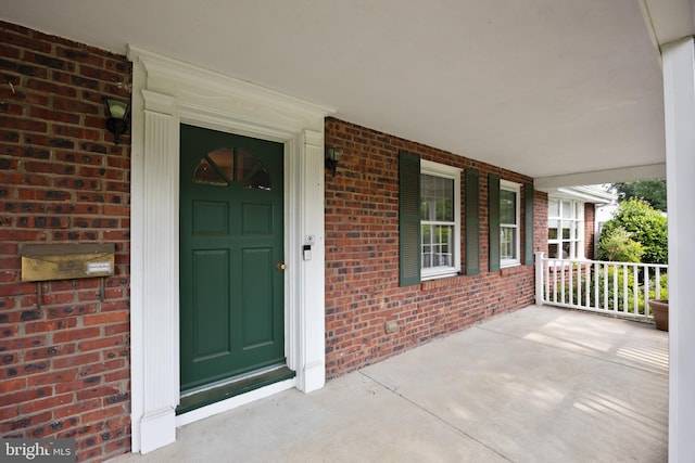 1101 Cherry Ln, Cinnaminson, NJ 08077 - entrance to property with covered porch and brick siding