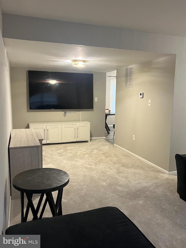 9031 Continental Pl, Landover, MD 20785 - living room with light carpet and baseboards