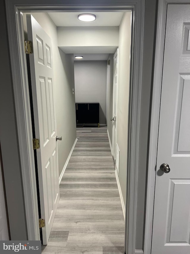9031 Continental Pl, Landover, MD 20785 - corridor with light wood-style flooring and baseboards