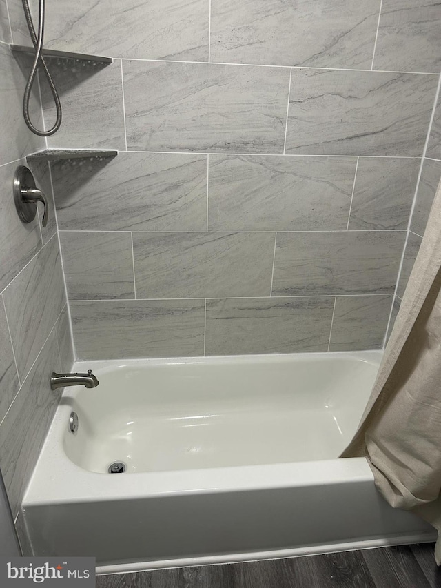 9031 Continental Pl, Landover, MD 20785 - full bathroom with shower / bath combo and wood finished floors