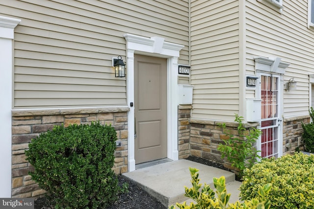 402 Woodcrest Dr SE, Washington, DC 20032 - view of exterior entry with stone siding
