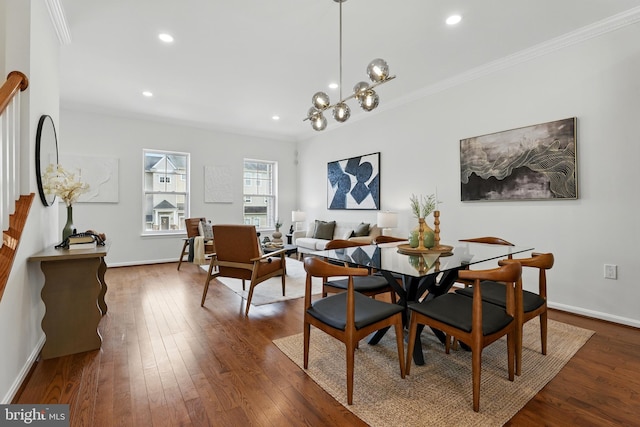 402 Woodcrest Dr SE, Washington, DC 20032 - dining area featuring ornamental molding, dark wood-type flooring, recessed lighting, baseboards, and a chandelier