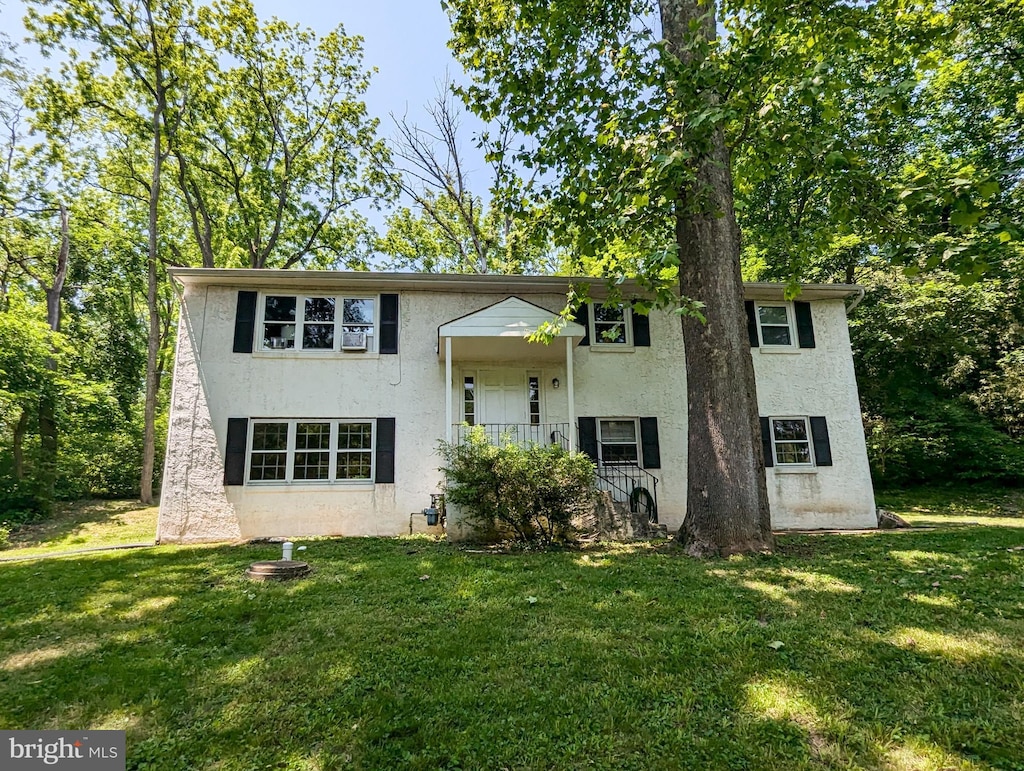 6287 Lower Mountain Rd, New Hope, PA 18938 - view of front of property featuring stucco siding, a front lawn, and cooling unit