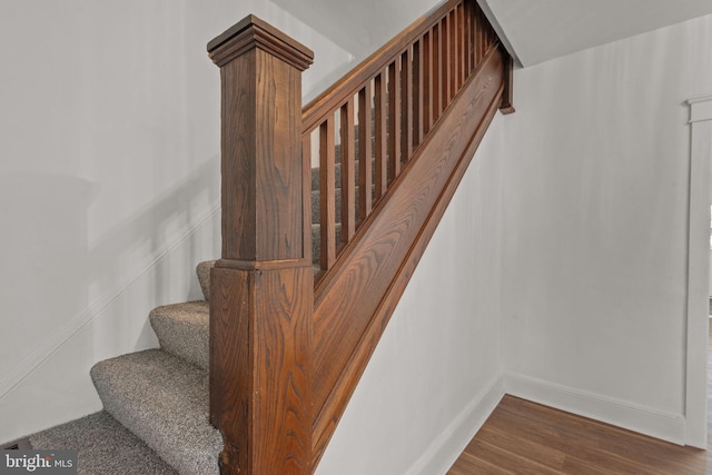 143 N 2nd St, Mount Wolf, PA 17347 - staircase with wood finished floors and baseboards