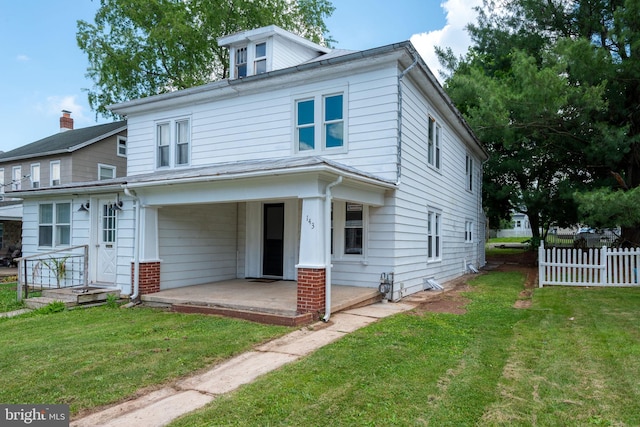 143 N 2nd St, Mount Wolf, PA 17347 - american foursquare style home with covered porch