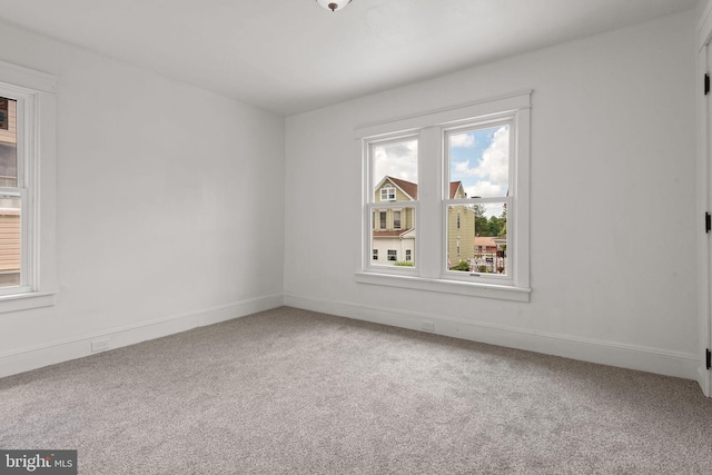 143 N 2nd St, Mount Wolf, PA 17347 - spare room with carpet floors and baseboards