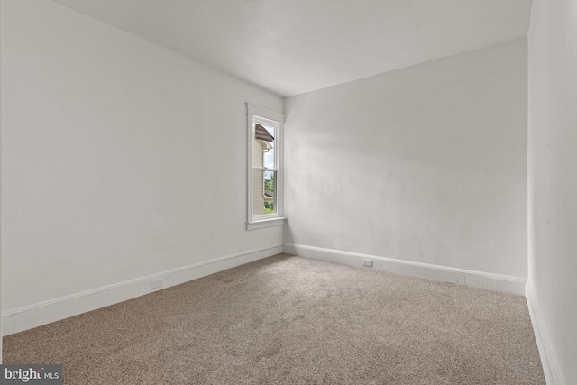 143 N 2nd St, Mount Wolf, PA 17347 - carpeted spare room featuring baseboards