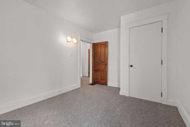 143 N 2nd St, Mount Wolf, PA 17347 - unfurnished bedroom featuring carpet floors, baseboards, and a closet