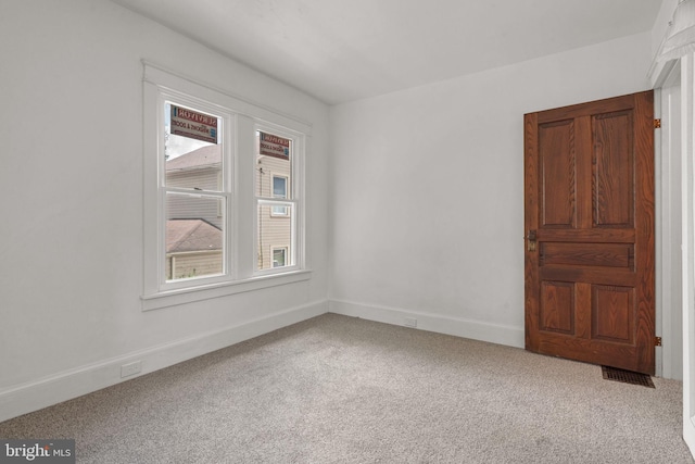 143 N 2nd St, Mount Wolf, PA 17347 - empty room with carpet flooring and baseboards