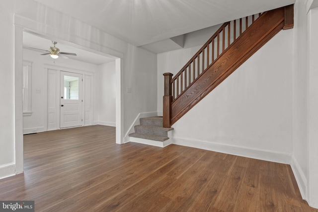 143 N 2nd St, Mount Wolf, PA 17347 - foyer featuring baseboards, stairs, wood finished floors, and a ceiling fan