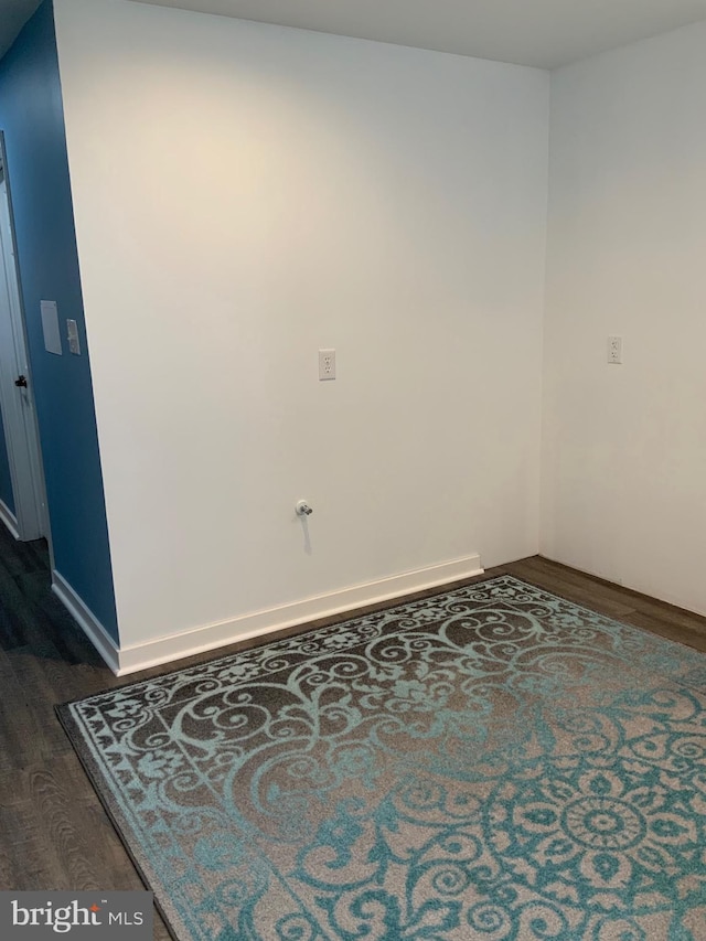 124 Chandlers Glen Dr, Bunker Hill, WV 25413 - spare room featuring dark wood finished floors and baseboards