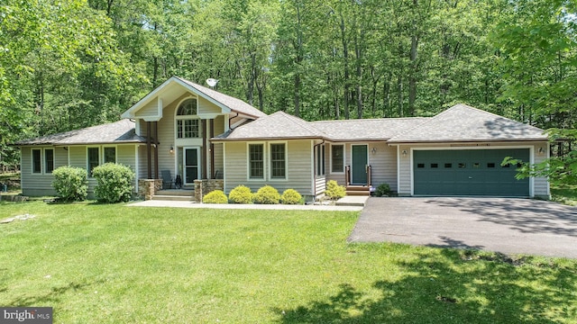 793 Mountainview Dr, Oakland, MD 21550 - view of front of house with driveway, a garage, a shingled roof, and a front yard
