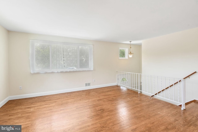 5729 Nevada St, Berwyn Heights, MD 20740 - spare room featuring wood finished floors and baseboards