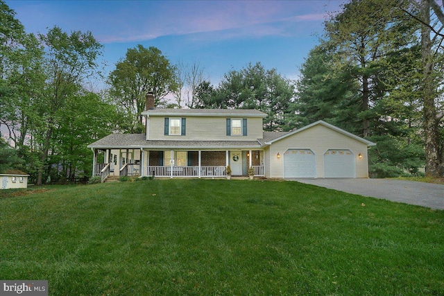 3498 Augusta Dr, Ijamsville, MD 21754 - view of front of property with a porch, a garage, a chimney, asphalt driveway, and a front lawn