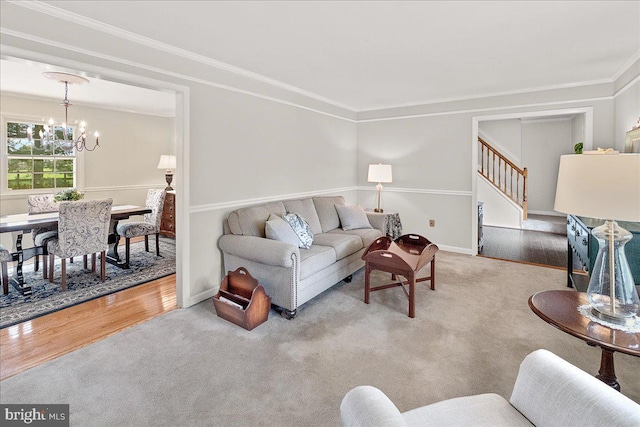3498 Augusta Dr, Ijamsville, MD 21754 - carpeted living area with stairway, crown molding, a chandelier, wood finished floors, and baseboards