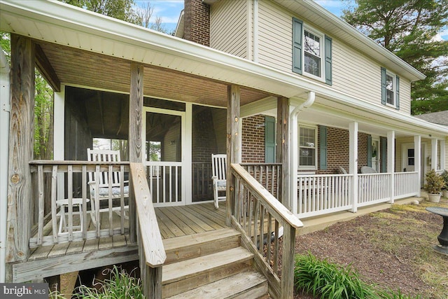 3498 Augusta Dr, Ijamsville, MD 21754 - view of front facade featuring covered porch and a chimney