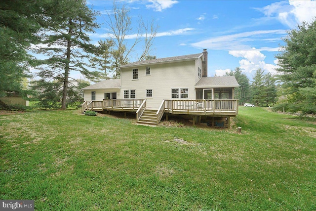 3498 Augusta Dr, Ijamsville, MD 21754 - rear view of house featuring a chimney, a sunroom, a wooden deck, and a lawn
