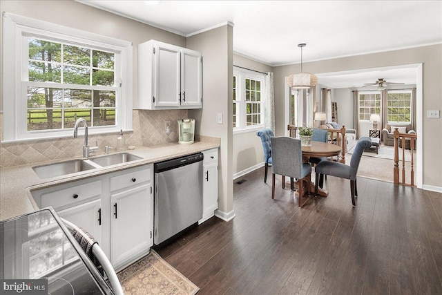 3498 Augusta Dr, Ijamsville, MD 21754 - kitchen featuring stainless steel dishwasher, a sink, white cabinetry, light countertops, and ornamental molding
