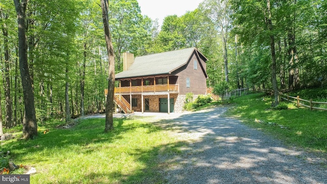 129 Bucks Crossing Ln, Accident, MD 21520 - chalet / cabin featuring stone siding, stairway, a chimney, driveway, and a view of trees