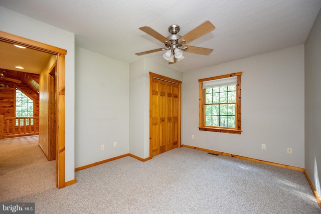 129 Bucks Crossing Ln, Accident, MD 21520 - unfurnished bedroom featuring carpet flooring, a closet, and a ceiling fan