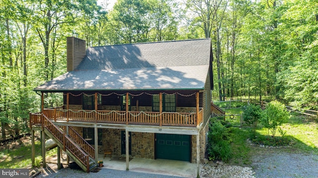 129 Bucks Crossing Ln, Accident, MD 21520 - rustic home with a chimney, a garage, roof with shingles, and stone siding