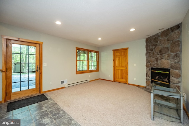 129 Bucks Crossing Ln, Accident, MD 21520 - unfurnished living room with a baseboard heating unit, healthy amount of natural light, recessed lighting, a fireplace, and carpet