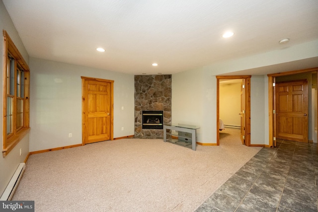 129 Bucks Crossing Ln, Accident, MD 21520 - unfurnished living room featuring a baseboard heating unit, a stone fireplace, a baseboard radiator, recessed lighting, and carpet floors