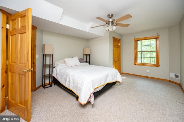 129 Bucks Crossing Ln, Accident, MD 21520 - bedroom with light carpet, a skylight, and a ceiling fan