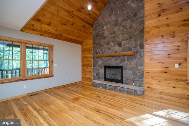129 Bucks Crossing Ln, Accident, MD 21520 - unfurnished living room with lofted ceiling, wood finished floors, a fireplace, and wooden ceiling