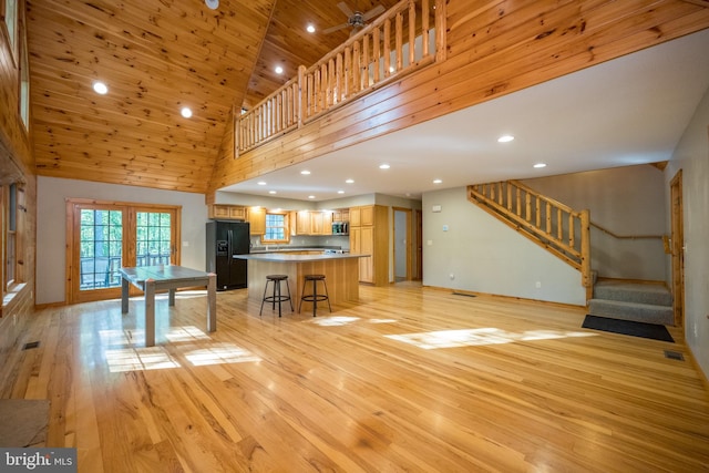 129 Bucks Crossing Ln, Accident, MD 21520 - living area with high vaulted ceiling, stairway, light wood-style floors, wood ceiling, and recessed lighting