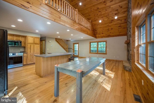 129 Bucks Crossing Ln, Accident, MD 21520 - kitchen with stainless steel appliances, recessed lighting, light wood-style flooring, a center island, and wooden ceiling