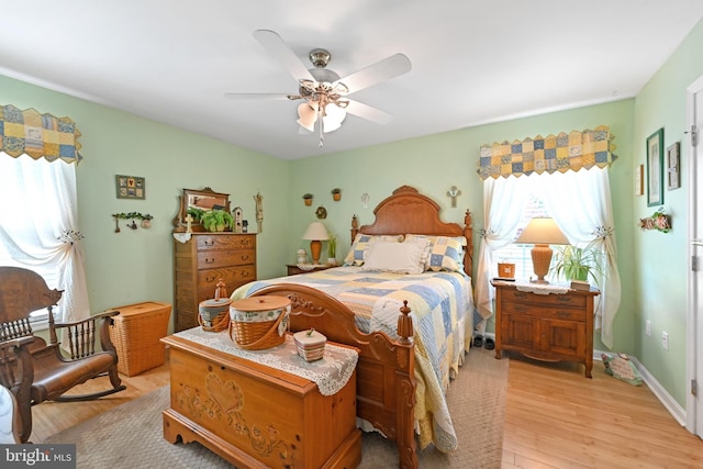 11684 Kensington Way, Laurel, DE 19956 - bedroom featuring multiple windows, light wood-style floors, and ceiling fan