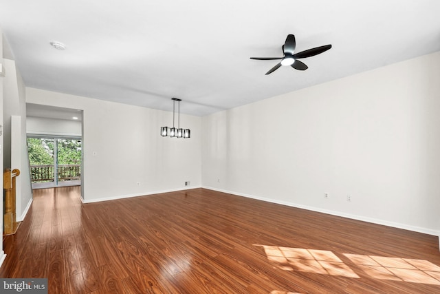 2441 Wheat Meadow Cir, Herndon, VA 20171 - spare room featuring dark wood-type flooring and a ceiling fan