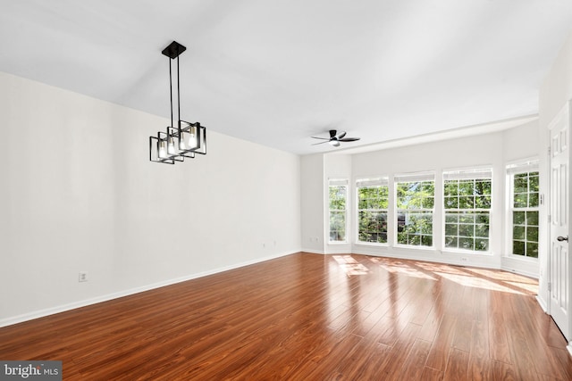2441 Wheat Meadow Cir, Herndon, VA 20171 - empty room with a ceiling fan and wood finished floors