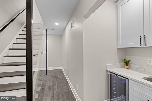 933 S 3rd St, Philadelphia, PA 19147 - indoor bar with beverage cooler, stairway, wood finished floors, and recessed lighting