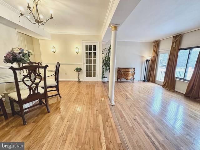 1249 Birchcrest Ct, Arnold, MD 21012 - dining room featuring crown molding, a chandelier, light wood-style flooring, and baseboards