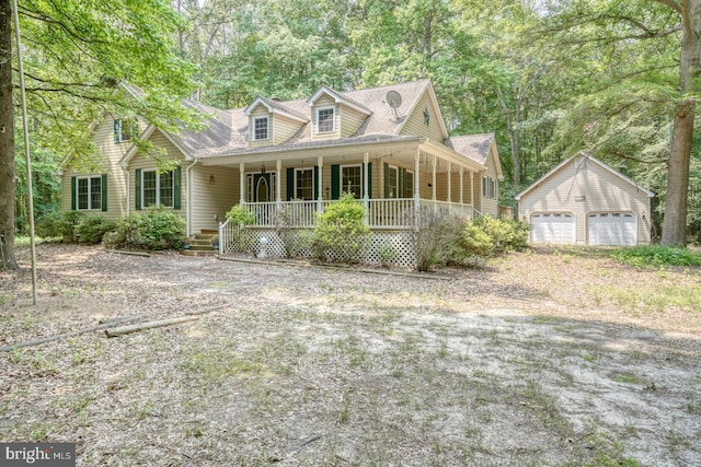 14462 Poplar St, Goldsboro, MD 21636 - view of front of property featuring an outdoor structure, a detached garage, covered porch, and a shingled roof